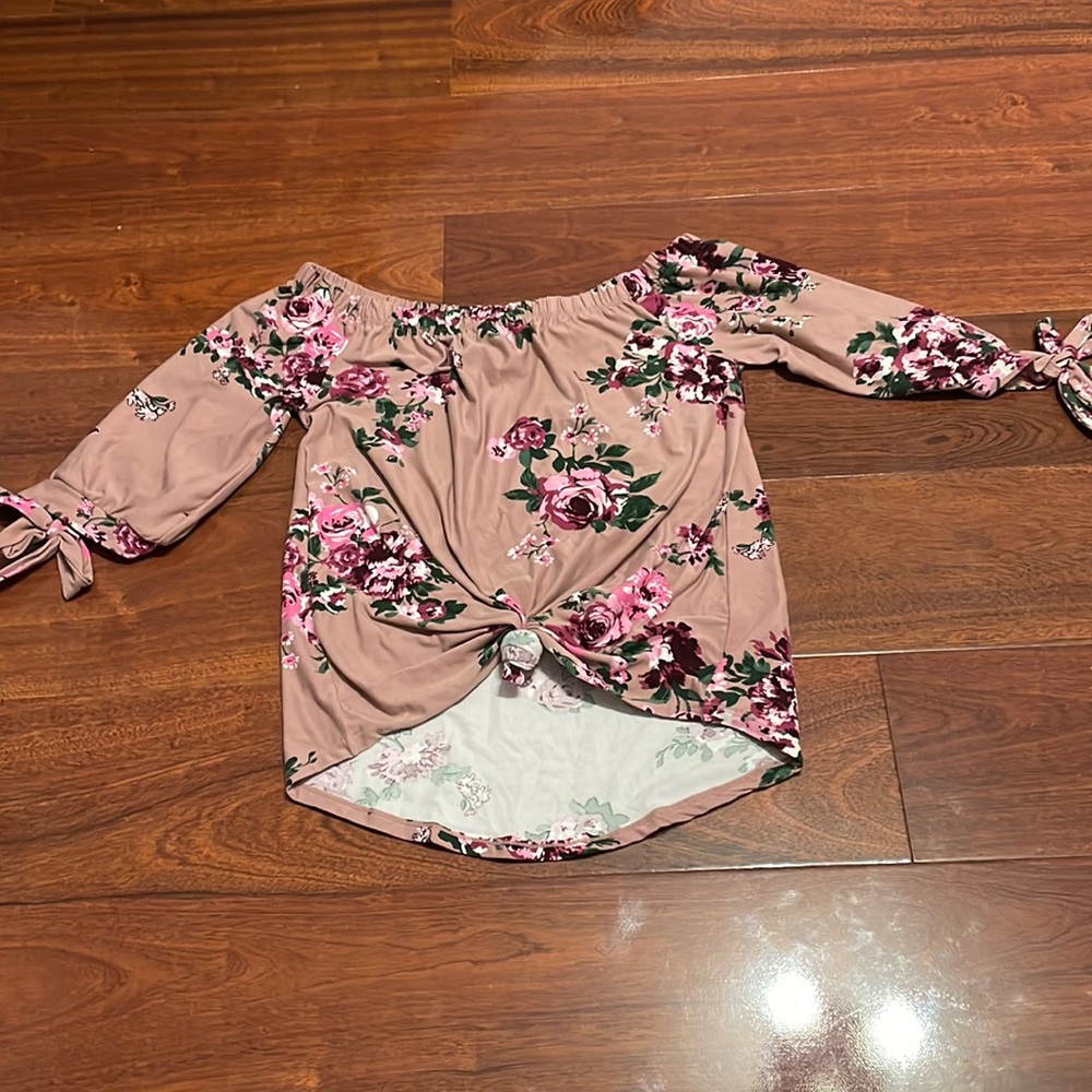 purple/pinkish shirt with flowers. size large from no boundaries